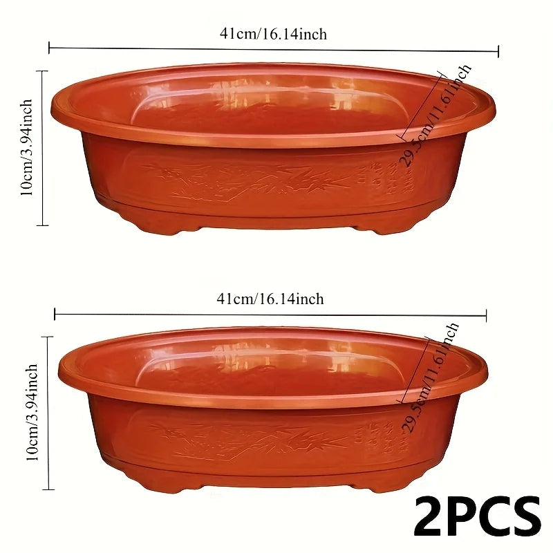 2 large oval plastic flower pots for indoor plant cultivation. Decorative flower pots for indoor plants.